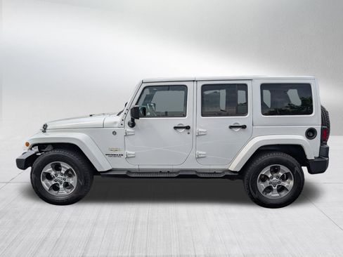 Used 2015 Jeep Wrangler Unlimited Sahara w/ Dual Top Group AWD/4WD image 4