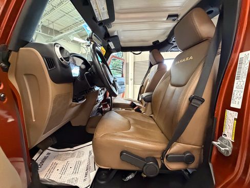 Used 2014 Jeep Wrangler Unlimited Sahara w/ Dual Top Group AWD/4WD image 53