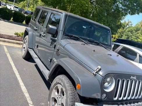 Used 2016 Jeep Wrangler Unlimited Sahara w/ Connectivity Group AWD/4WD image 1
