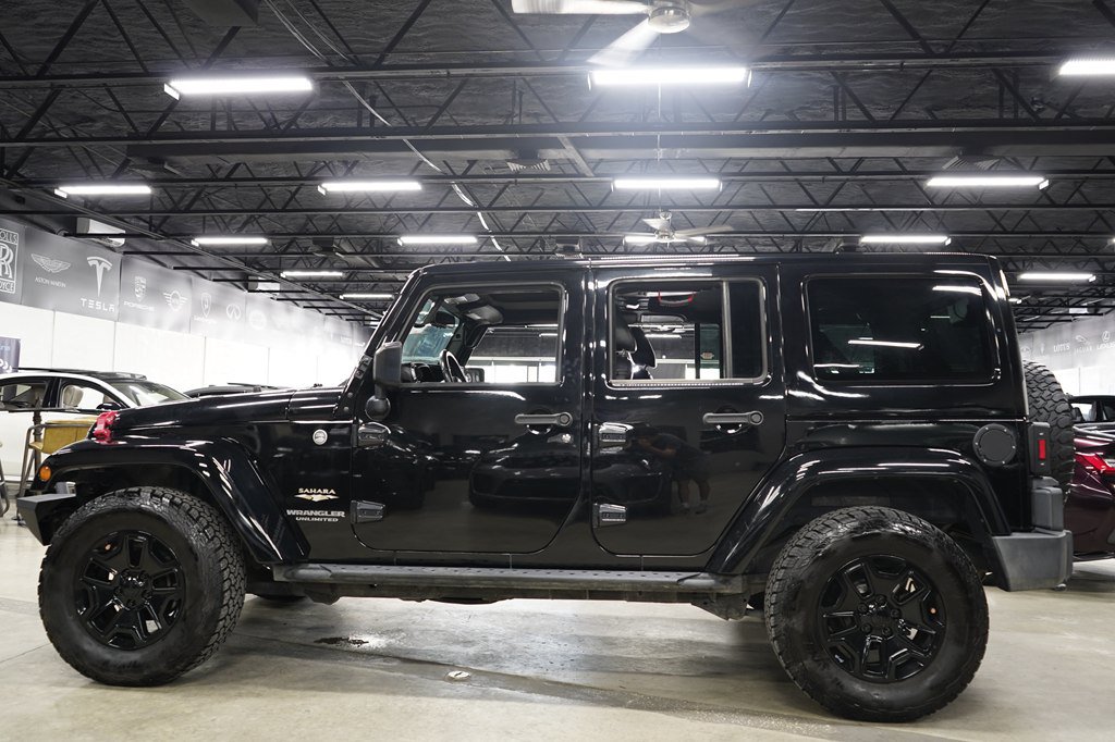 Used 2015 Jeep Wrangler Unlimited Sahara w/ Dual Top Group AWD/4WD image 2
