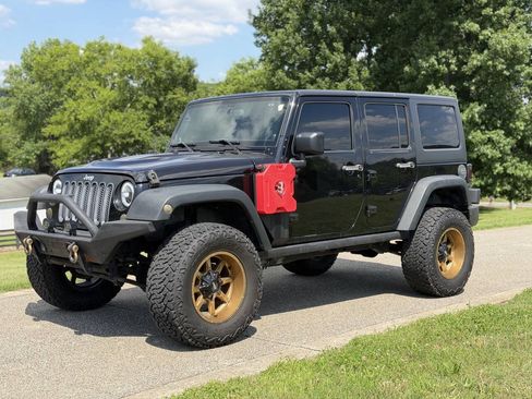 Used 2014 Jeep Wrangler Unlimited Rubicon w/ Dual Top Group AWD/4WD image 3