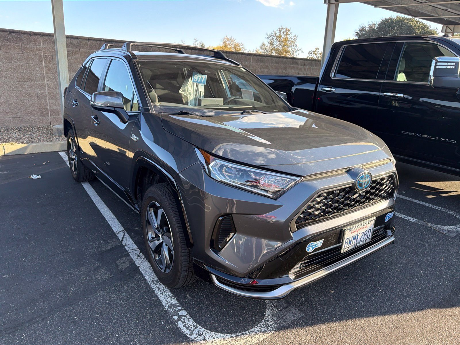 Used 2021 Toyota RAV4 SE w/ Weather & Moonroof Package AWD/4WD image 2