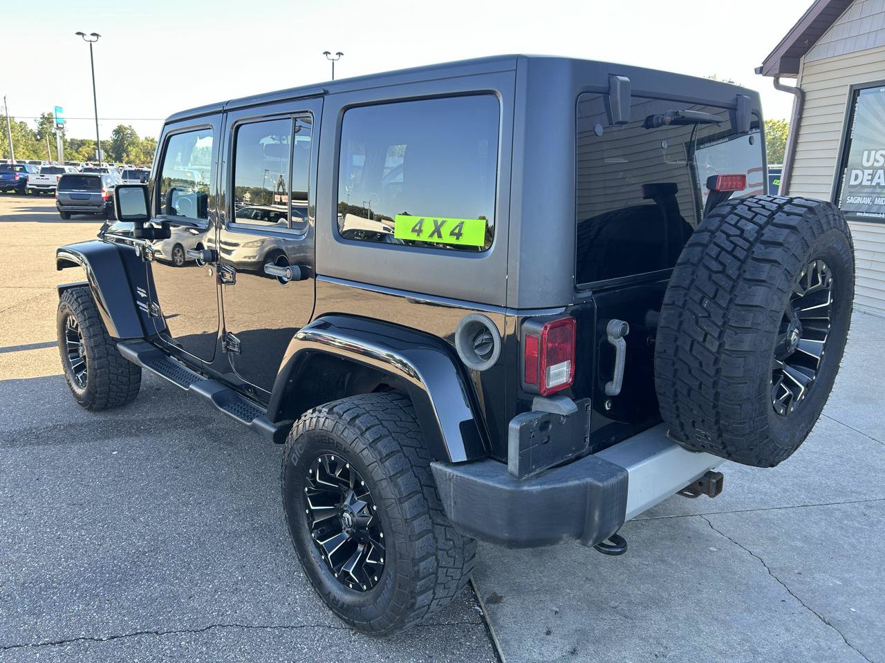 Used 2014 Jeep Wrangler Unlimited Sahara w/ Dual Top Group AWD/4WD image 7
