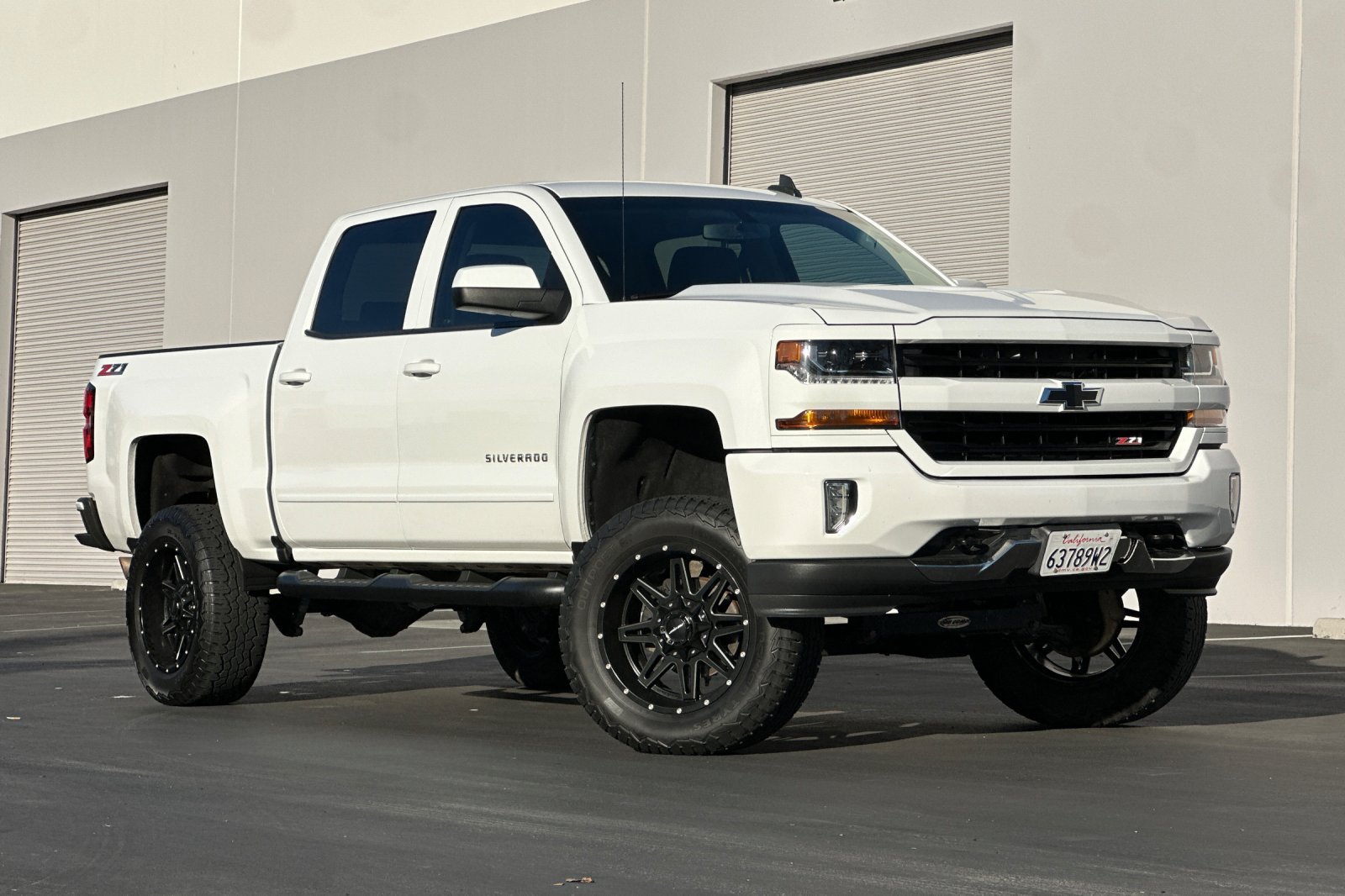 Used 2017 Chevrolet Silverado 1500 LT w/ LPO, Black Pack AWD/4WD image 2