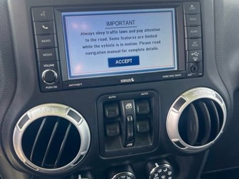 Used 2013 Jeep Wrangler Unlimited Sahara w/ Dual Top Group AWD/4WD image 13