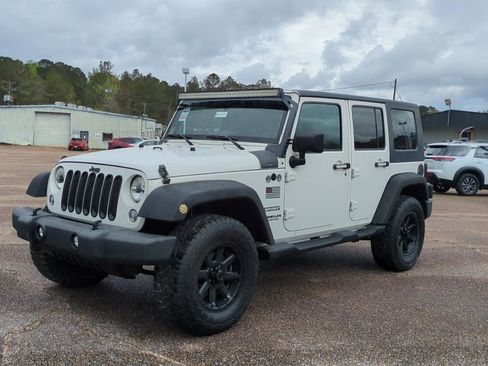 Used 2010 Jeep Wrangler Unlimited Sport image 1