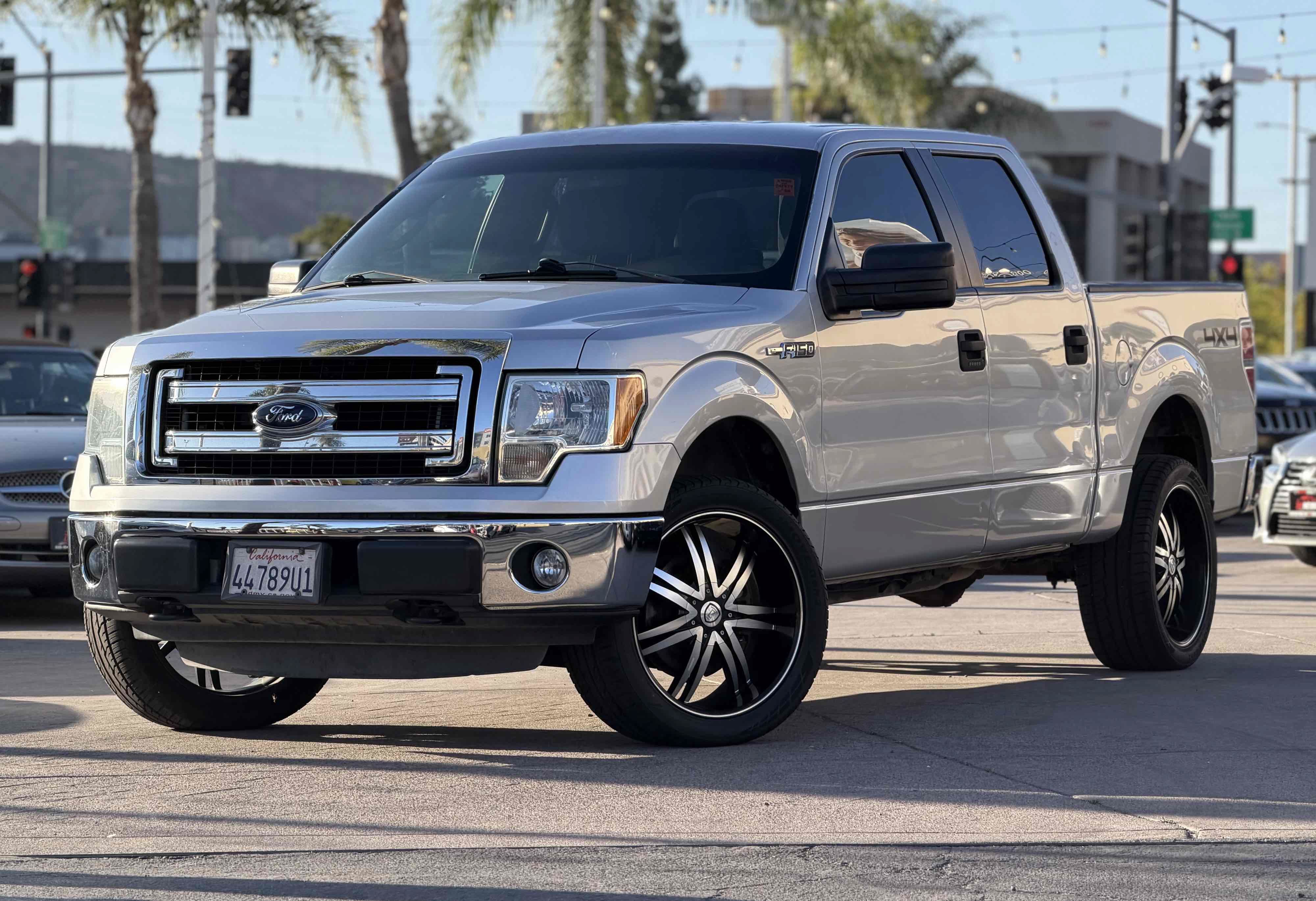 Used 2014 Ford F150 XLT AWD/4WD image 1