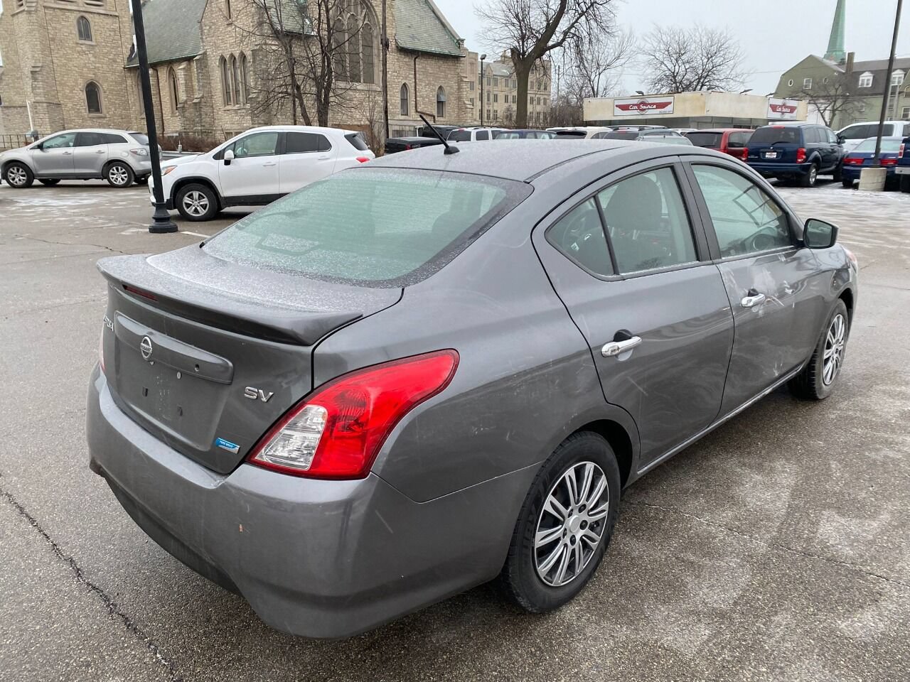 Used 2016 Nissan Versa SV FWD image 1