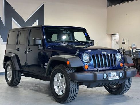 Used 2013 Jeep Wrangler Unlimited Sport AWD/4WD image 2