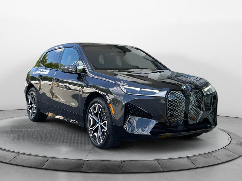 Used 2024 BMW iX xDrive50 w/ Premium Package AWD/4WD image 1