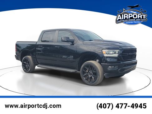 Used 2023 RAM 1500 Laramie AWD/4WD image 1