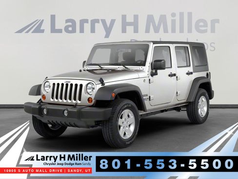 Used 2010 Jeep Wrangler Unlimited Sahara w/ Trailer Tow Group AWD/4WD image 1