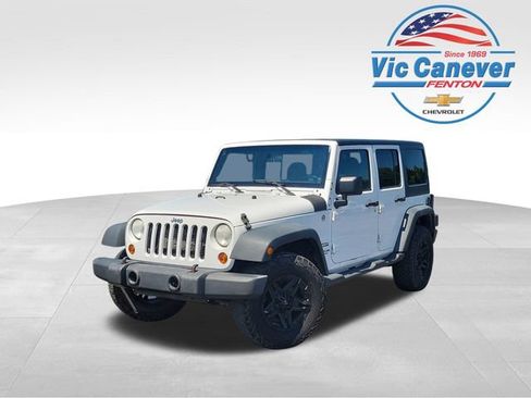 Used 2012 Jeep Wrangler Unlimited Sport AWD/4WD image 1