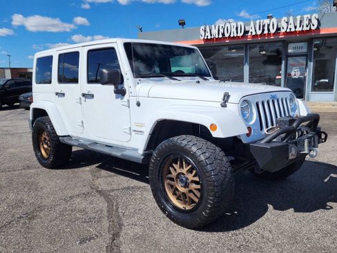 Used 2012 Jeep Wrangler Unlimited Sahara w/ Trailer Tow Group AWD/4WD image 2
