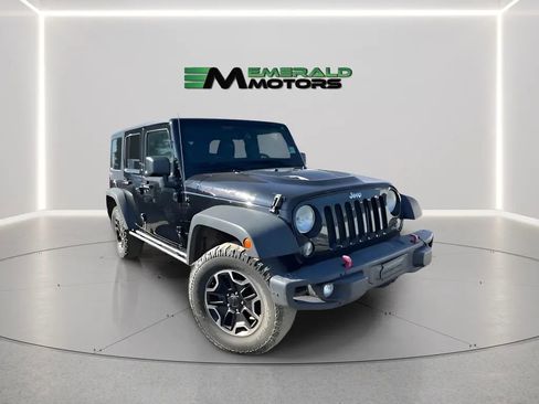 Used 2014 Jeep Wrangler Unlimited Rubicon w/ Dual Top Group AWD/4WD image 1