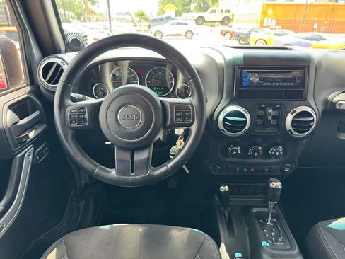 Used 2014 Jeep Wrangler Unlimited Sahara w/ Max Tow Package AWD/4WD image 35