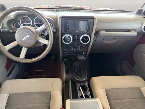 Used 2010 Jeep Wrangler Unlimited Sahara w/ Dual Top Group AWD/4WD image 14