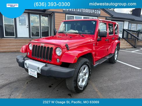 Used 2014 Jeep Wrangler Unlimited Sahara w/ Dual Top Group AWD/4WD image 1