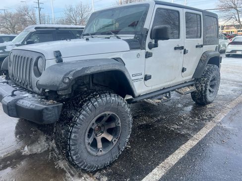 Used 2012 Jeep Wrangler Unlimited Sport image 1