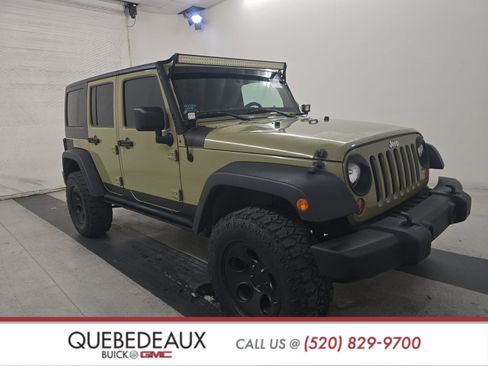 Used 2013 Jeep Wrangler Unlimited Sport w/ Max Tow Pkg image 1
