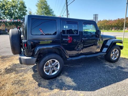 Used 2013 Jeep Wrangler Unlimited Sahara w/ Connectivity Group AWD/4WD image 2