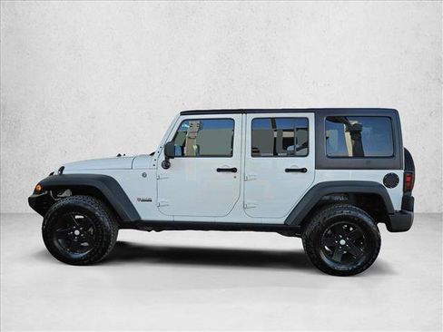Used 2013 Jeep Wrangler Unlimited Sport AWD/4WD image 9