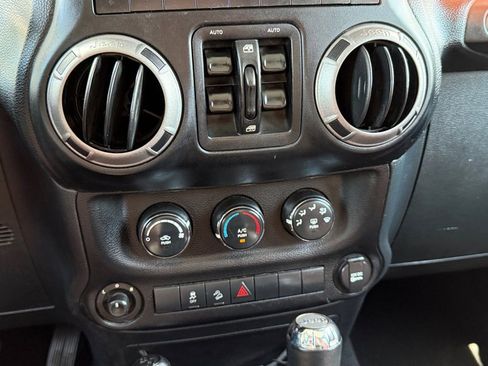 Used 2012 Jeep Wrangler Unlimited Sport AWD/4WD image 14