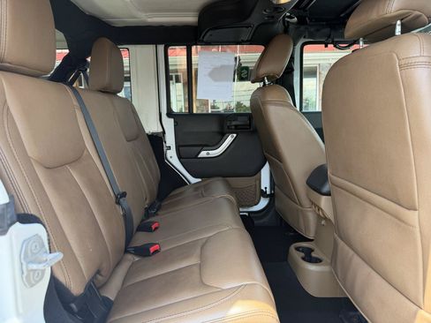 Used 2015 Jeep Wrangler Unlimited Sahara w/ Mopar Chrome Edition Group AWD/4WD image 19