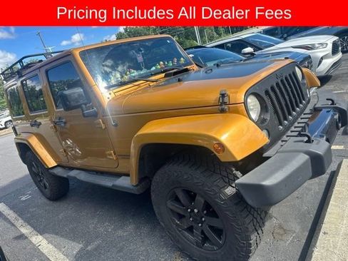 Used 2014 Jeep Wrangler Unlimited Sahara AWD/4WD image 1