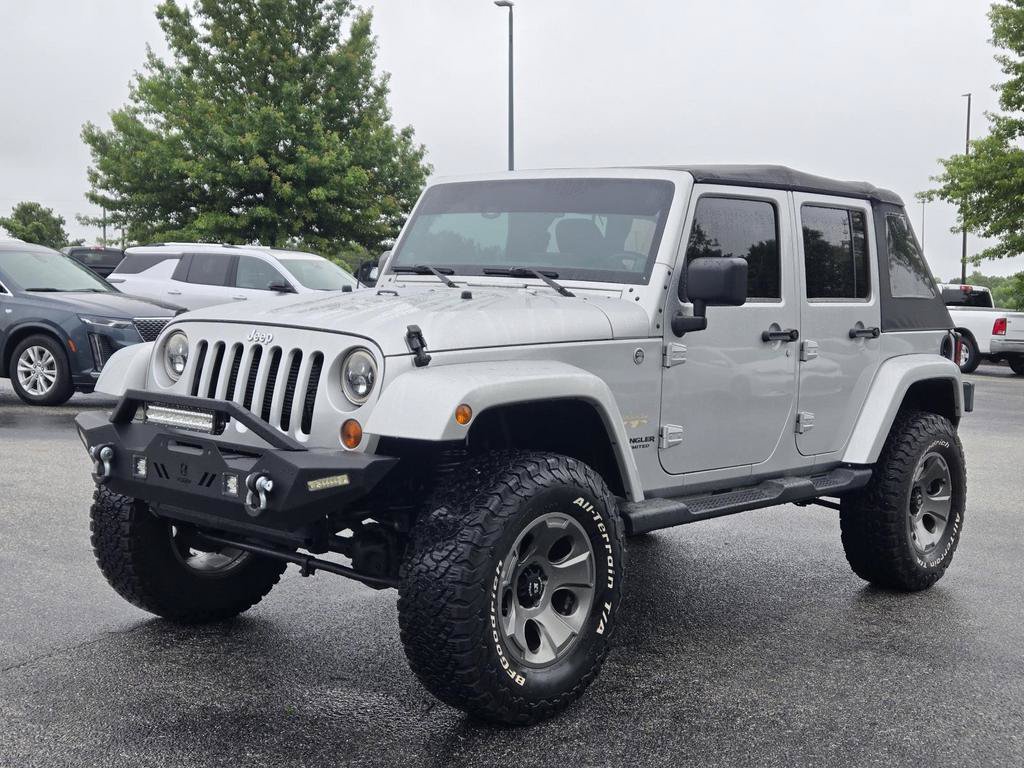 Used 2012 Jeep Wrangler Unlimited Sahara w/ Connectivity Group AWD/4WD image 1