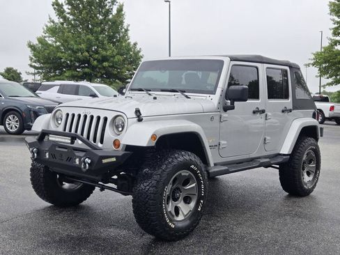 Used 2012 Jeep Wrangler Unlimited Sahara w/ Connectivity Group AWD/4WD image 1