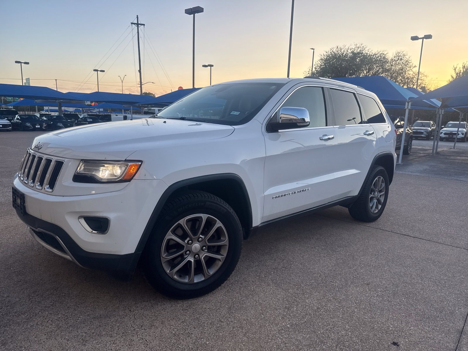 Used 2014 Jeep Grand Cherokee Limited w/ Luxury Group II AWD/4WD image 1