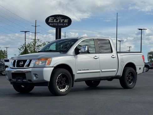 Used 2013 Nissan Titan SL AWD/4WD image 1
