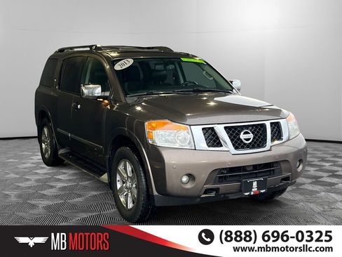 Used 2013 Nissan Armada Platinum image 1