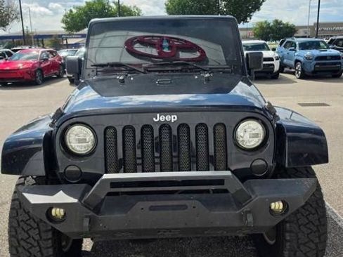 Used 2014 Jeep Wrangler Unlimited Sahara AWD/4WD image 1