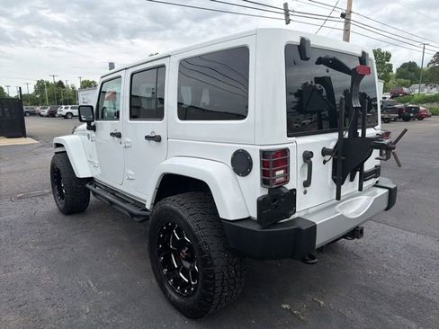 Used 2014 Jeep Wrangler Unlimited Sahara w/ Dual Top Group AWD/4WD image 6