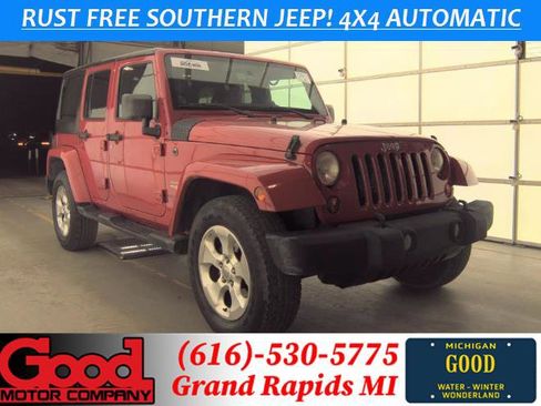 Used 2013 Jeep Wrangler Unlimited Sahara AWD/4WD image 1