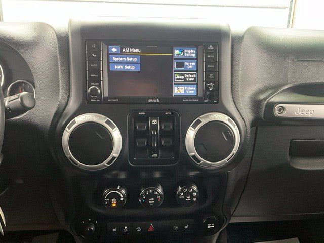 Used 2014 Jeep Wrangler Unlimited Sahara w/ Dual Top Group AWD/4WD image 9