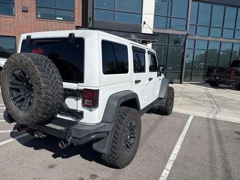 Used 2013 Jeep Wrangler Unlimited Sahara AWD/4WD image 2