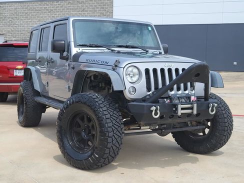 Used 2015 Jeep Wrangler Unlimited Rubicon w/ Max Tow Package AWD/4WD image 1