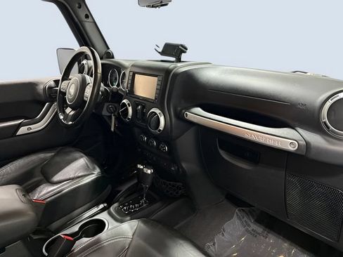 Used 2013 Jeep Wrangler Unlimited Sahara w/ Dual Top Group AWD/4WD image 11
