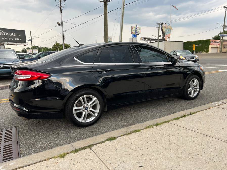 Used 2018 Ford Fusion SE w/ Fusion SE Technology Package FWD image 4