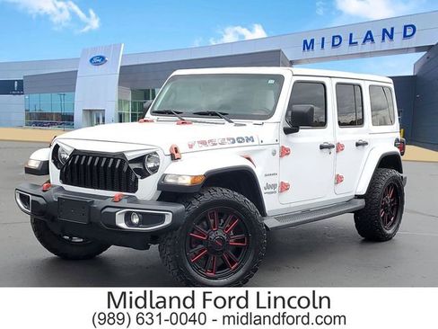 Used 2019 Jeep Wrangler Unlimited Sahara w/ Uconnect 4C Nav & Sound Group AWD/4WD image 1