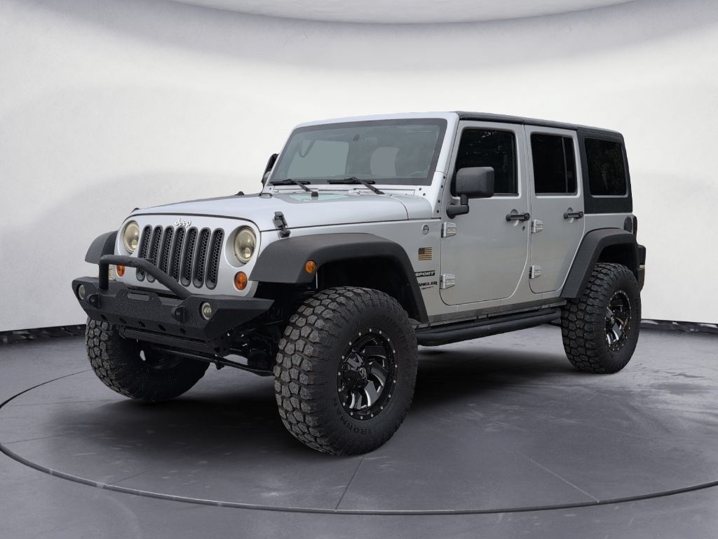 Used 2012 Jeep Wrangler Unlimited Sport AWD/4WD image 2