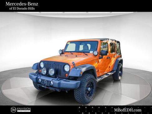 Used 2012 Jeep Wrangler Unlimited Sport AWD/4WD image 1