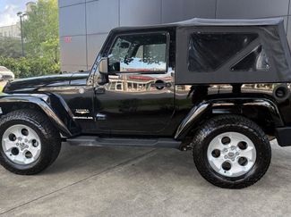 Used 2014 Jeep Wrangler Sahara w/ Connectivity Group AWD/4WD video 1