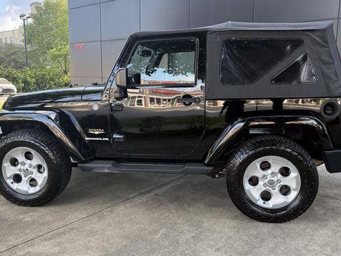 Used 2014 Jeep Wrangler Sahara w/ Connectivity Group AWD/4WD image 1