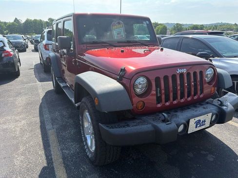 Used 2012 Jeep Wrangler Unlimited Sport AWD/4WD image 1