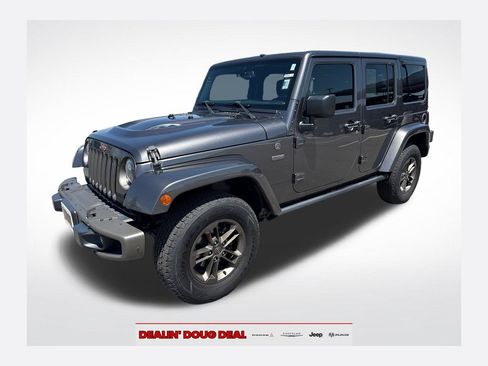 Used 2016 Jeep Wrangler Unlimited Sahara AWD/4WD image 1