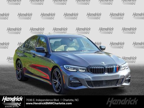Used 2021 BMW 330e w/ M Sport Package RWD image 1
